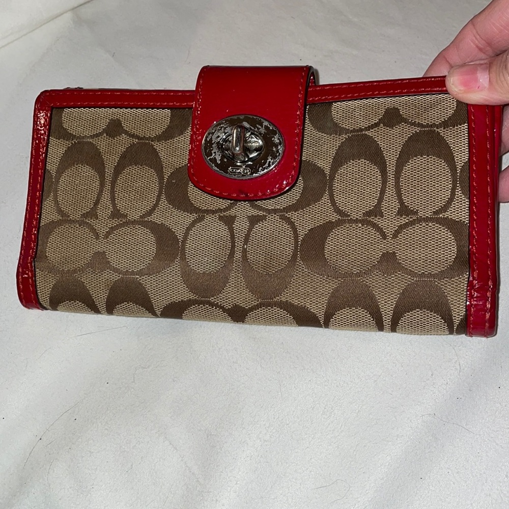 Coach clutch and checkbook cover
